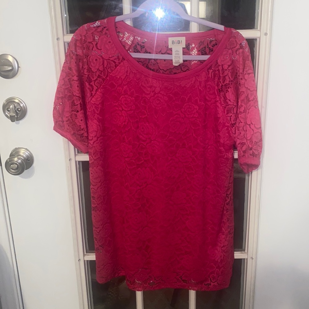 Dark hot pink lace pullover shirt. Dressy or casual.